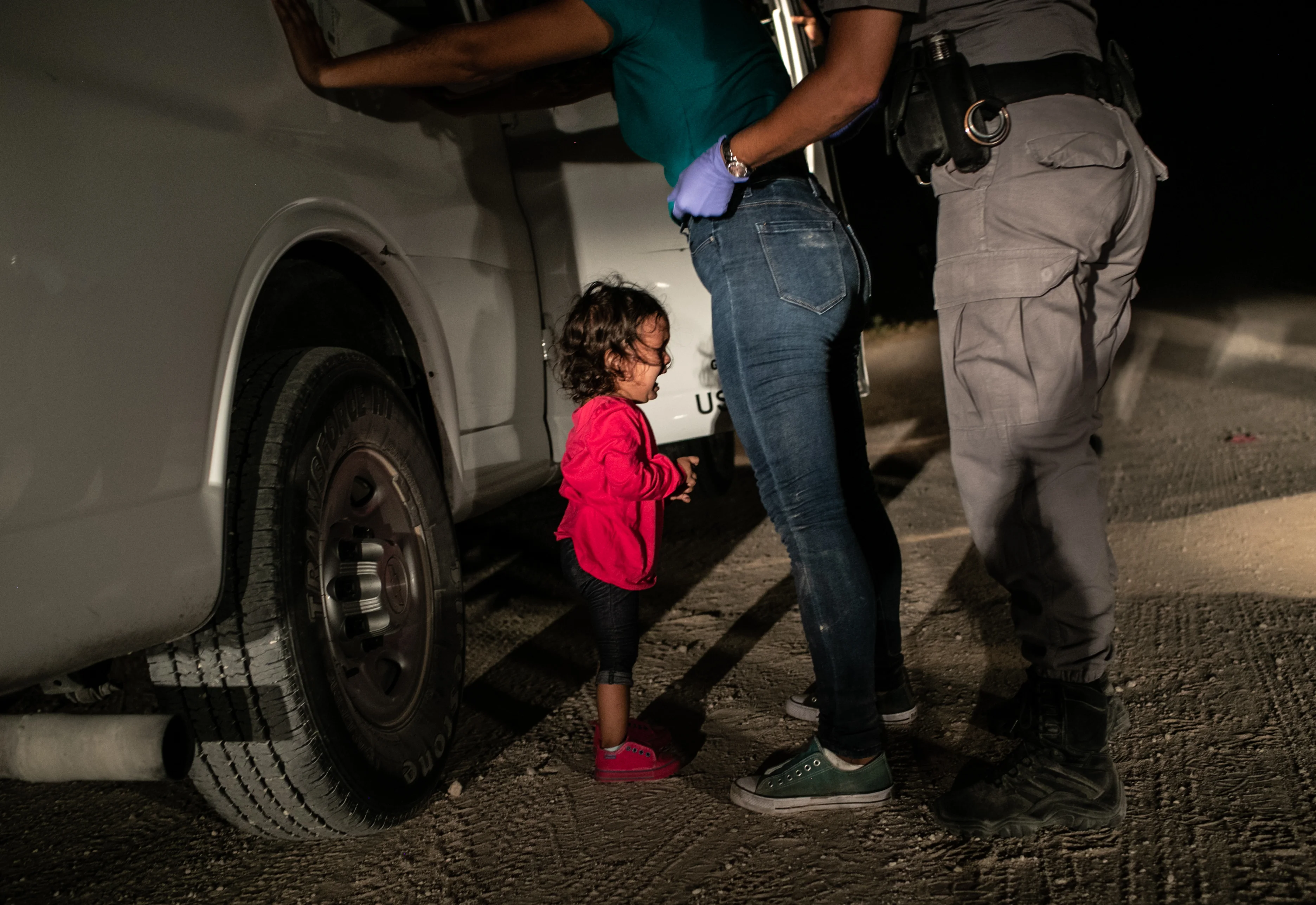 Honduran toddler Yanela Sanchez cries as she and her mother, Sandra Sanchez, are taken into custody by US border officials in McAllen, Texas, USA, on June 12.