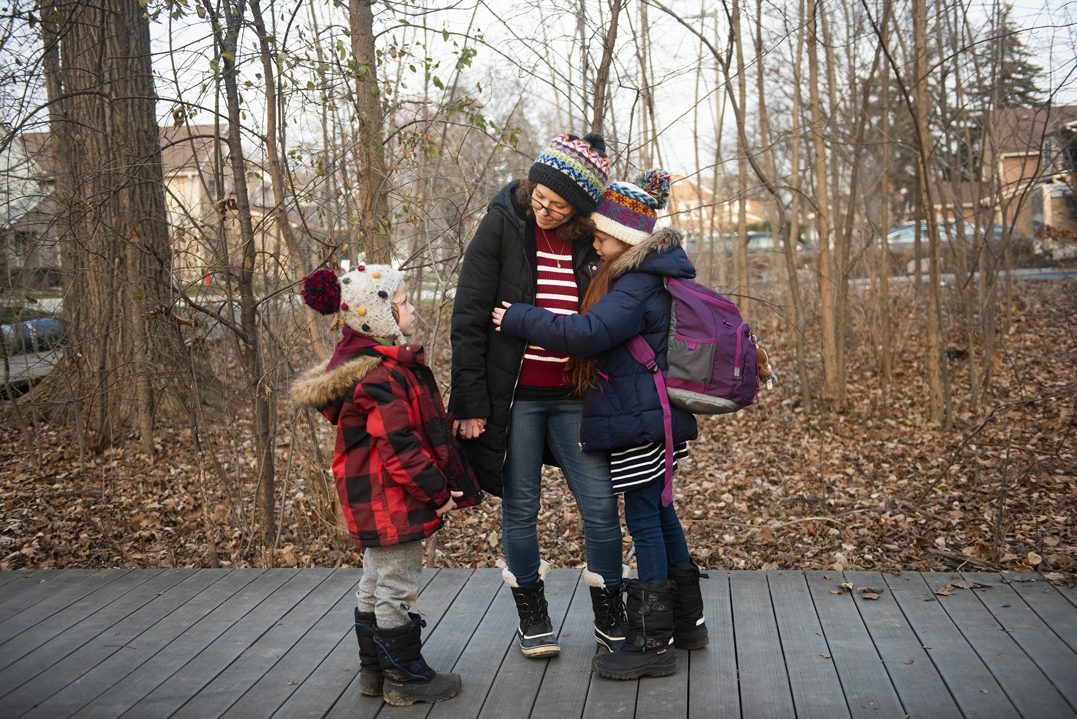Jill Promoli, is pictured with her children Thomas, 6, and Isla, 10, in Mississauga, Canada on Dec. 11, 2020.