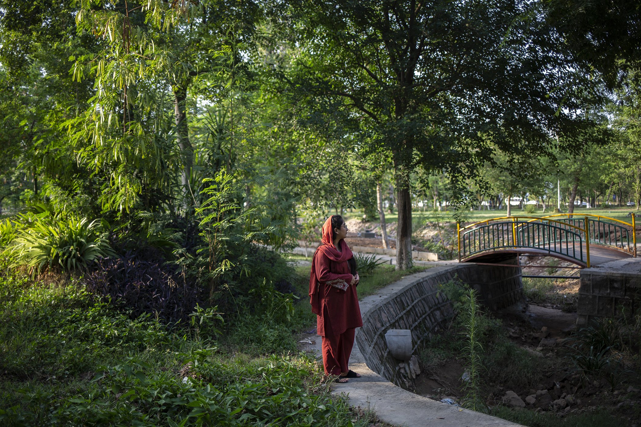 Zainab Waheed, photographed in Kachnar Park in Islamabad, Pakistan. Waheed is a climate activist and writer. She is involved in educating and mobilizing climate-vulnerable communities and also represents Pakistan at international climate conferences.
