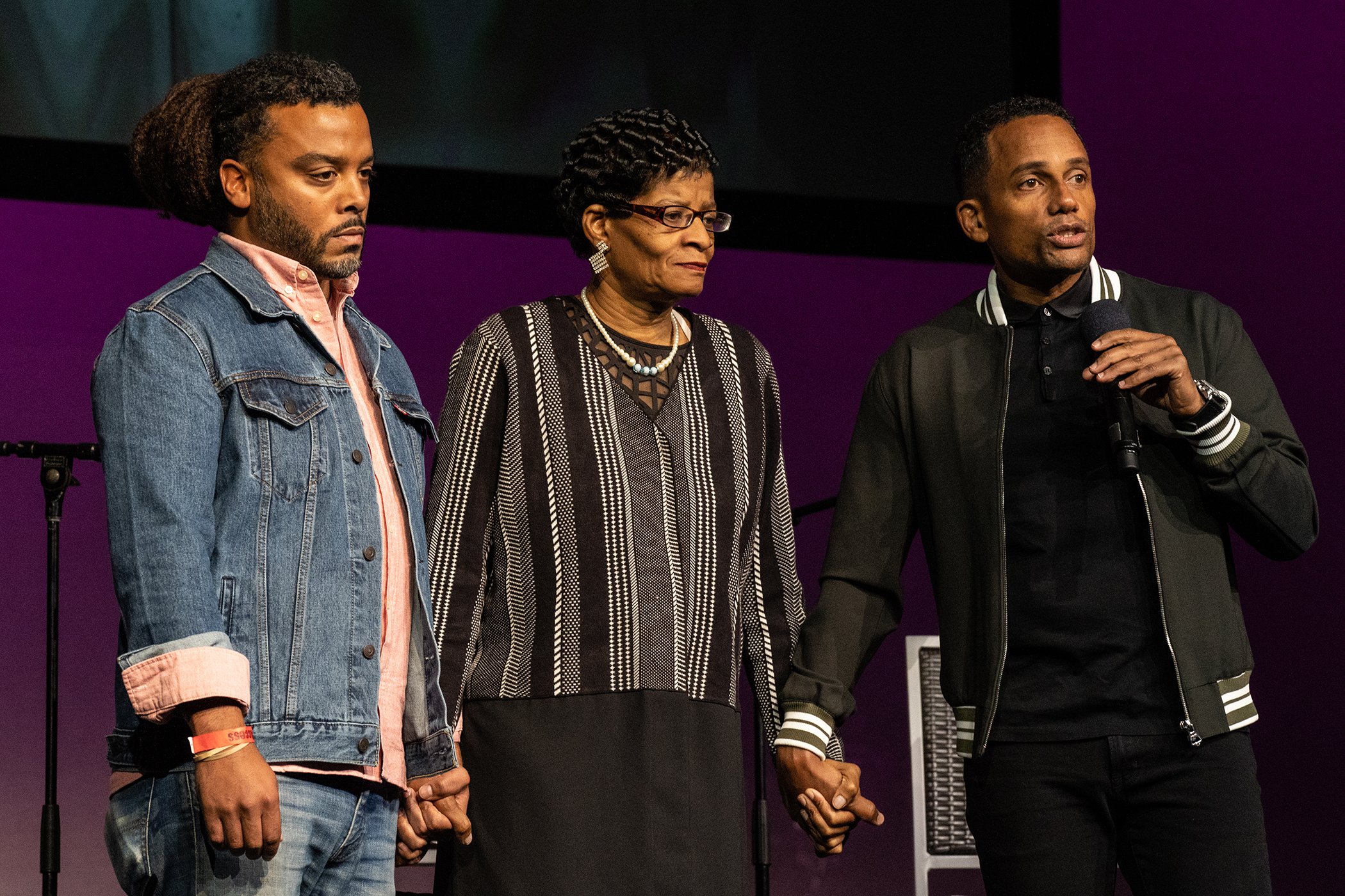 Adam Foss, Geneva Reed-Veal, and Hill Harper are pictured onstage during Global Citizen Week: At What Cost? at The Apollo Theater on Sept. 23, 2018 in New York City.
