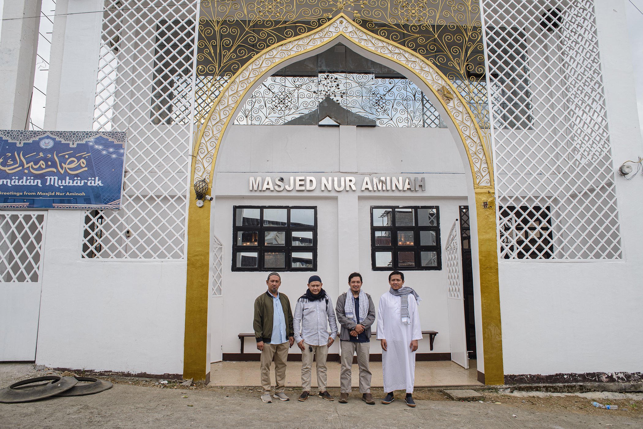Abdullah, second from the right, is photographed with other religious leaders in the Bangsamoro Autnomous Region in Muslim Mindanao on April 5, 2024. Across the BARMM region, community members often trust religious leaders more than they trust health work