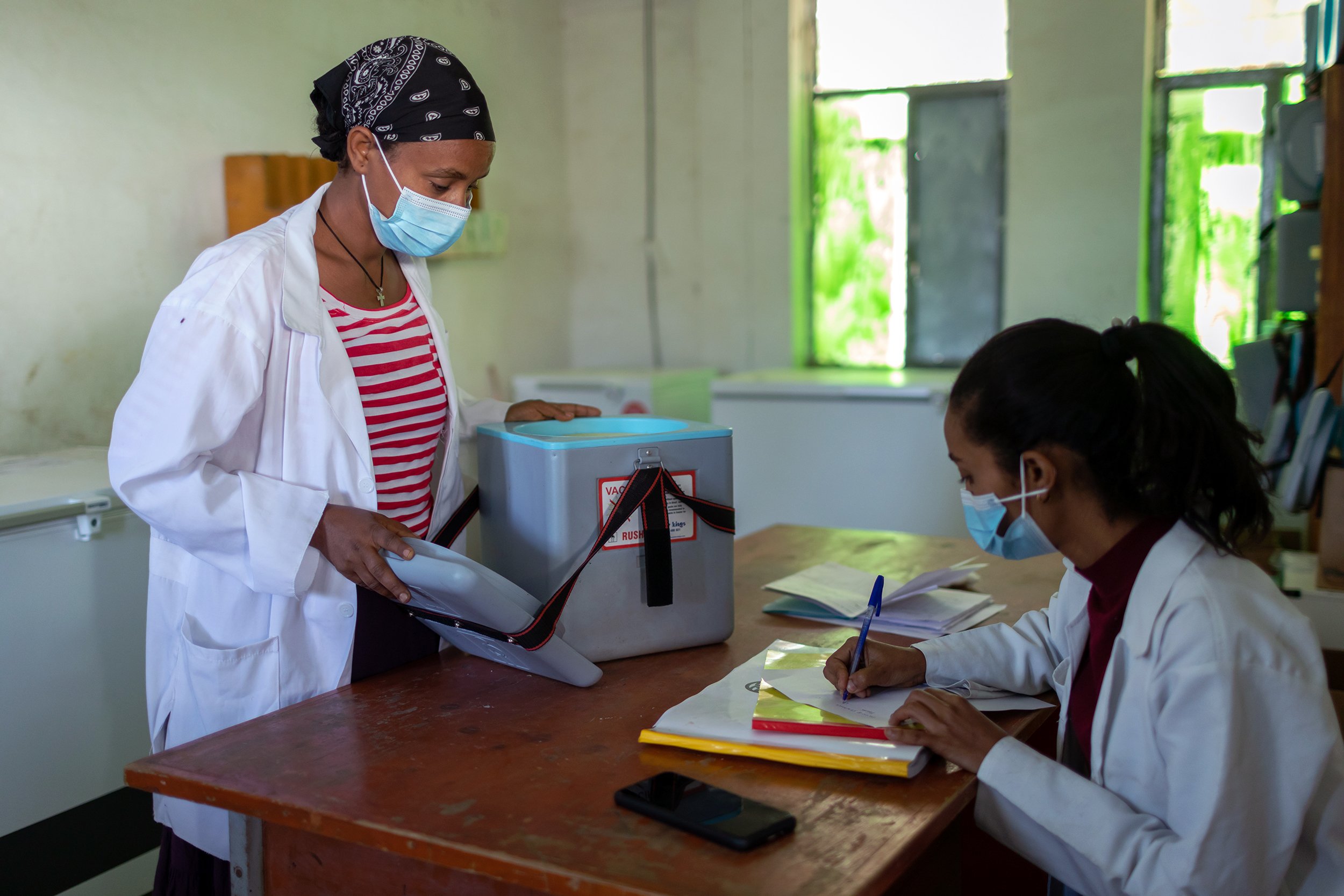 Health extension worker Misawey Abate collects vaccines from the Sekota Health Centre before she heads to the remote village of Aba Yohannes in the Waghimra zone of the Amhara region in May 2022.