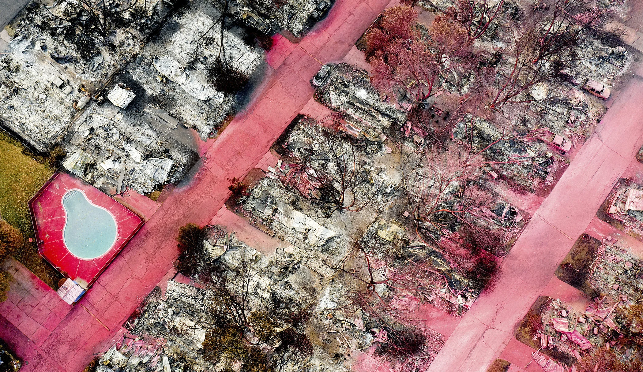 In this aerial photo taken with a drone, fire retardant blankets leveled homes in Talent, Ore., on Sept. 15, 2020, after the Almeda Fire tore through the area.