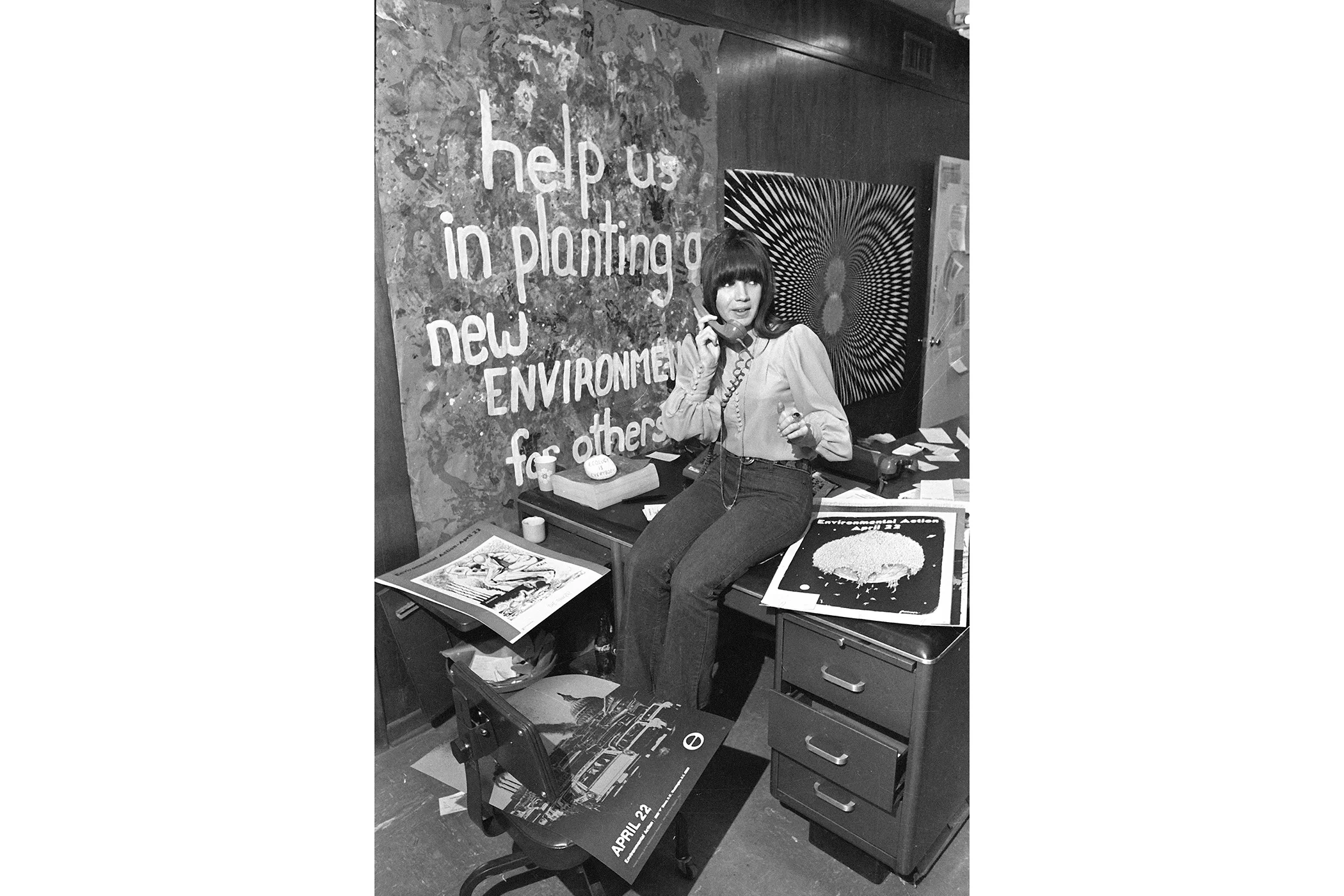 Judy Moody works in a poster-filled office of the Environment Teach-In, Inc., in Washington, April 9, 1970. The organization is coordinating school activities for the nationwide observance of Earth Day on April 22.