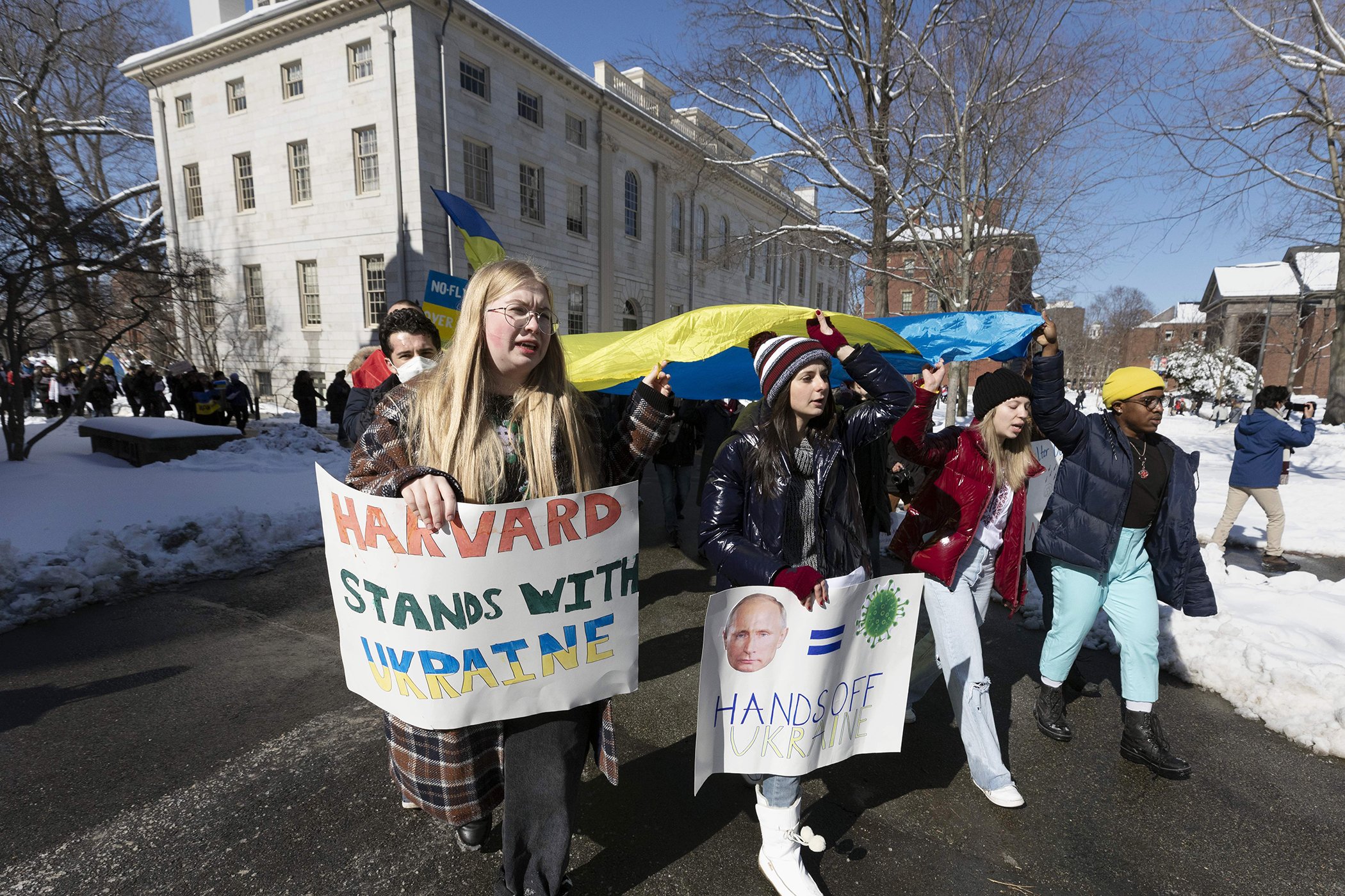 Students rally in support of Ukraine on the Harvard University campus, Saturday, Feb. 26, 2022, in Cambridge, Mass.
