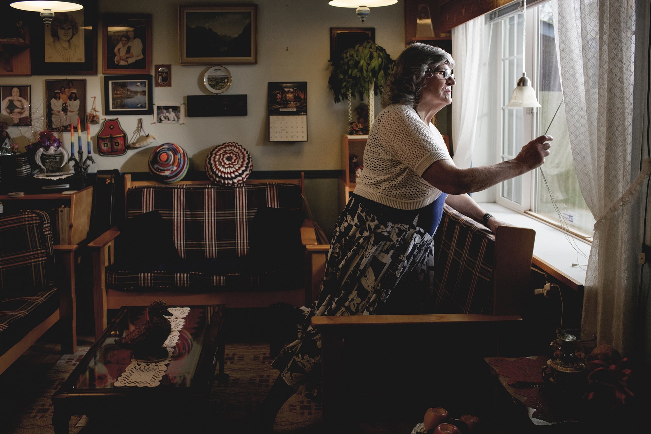 Northwest Passages: Mharie (83), in Eugene, Oregon, used to draw her curtains so that neighbors wouldn’t see her dressed in women’s clothes while her wife was out. Nominated in the Portraits Stories category.