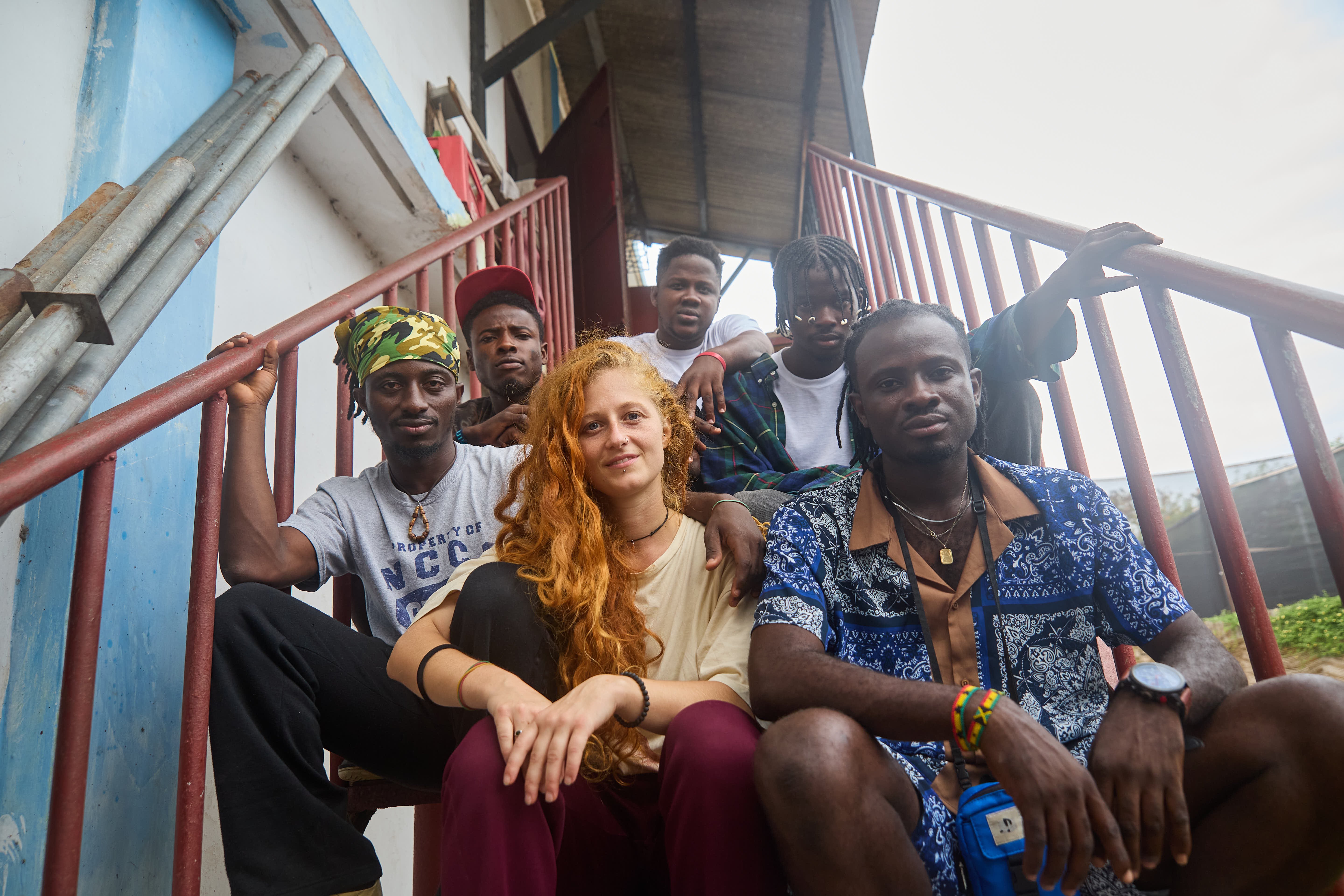 Sarpong members of Dance 4 Change Ghana on a staircase at the Ghetto studio
