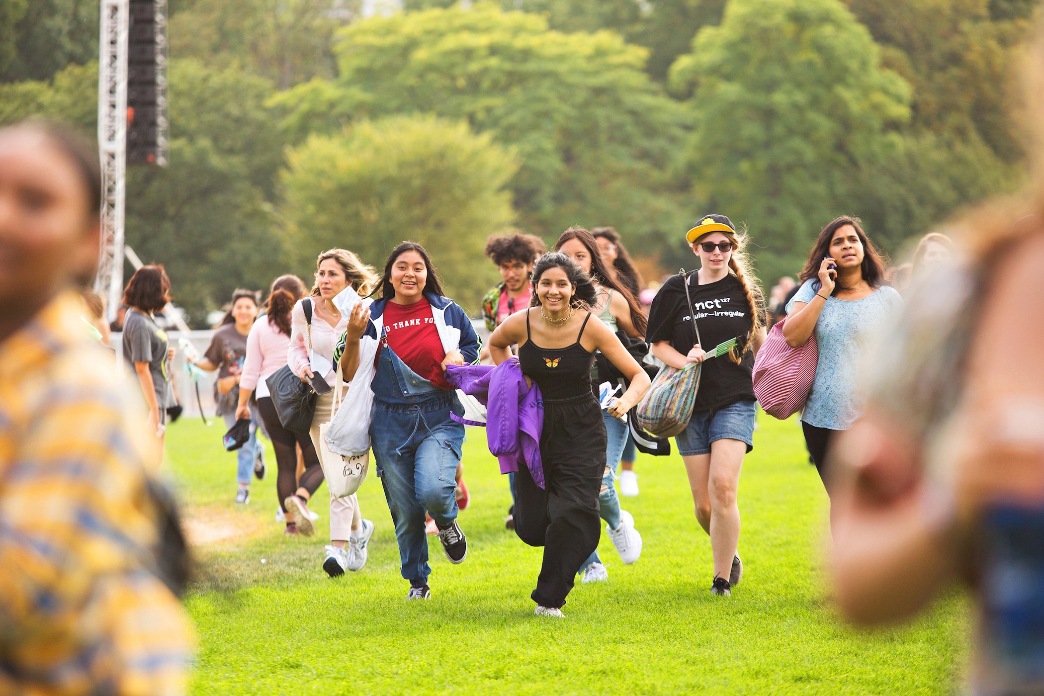Attendees run in as the gates are opened for the 2019 Global Citizen Festival in Central Park, on Sept. 28, 2019, in New York City.