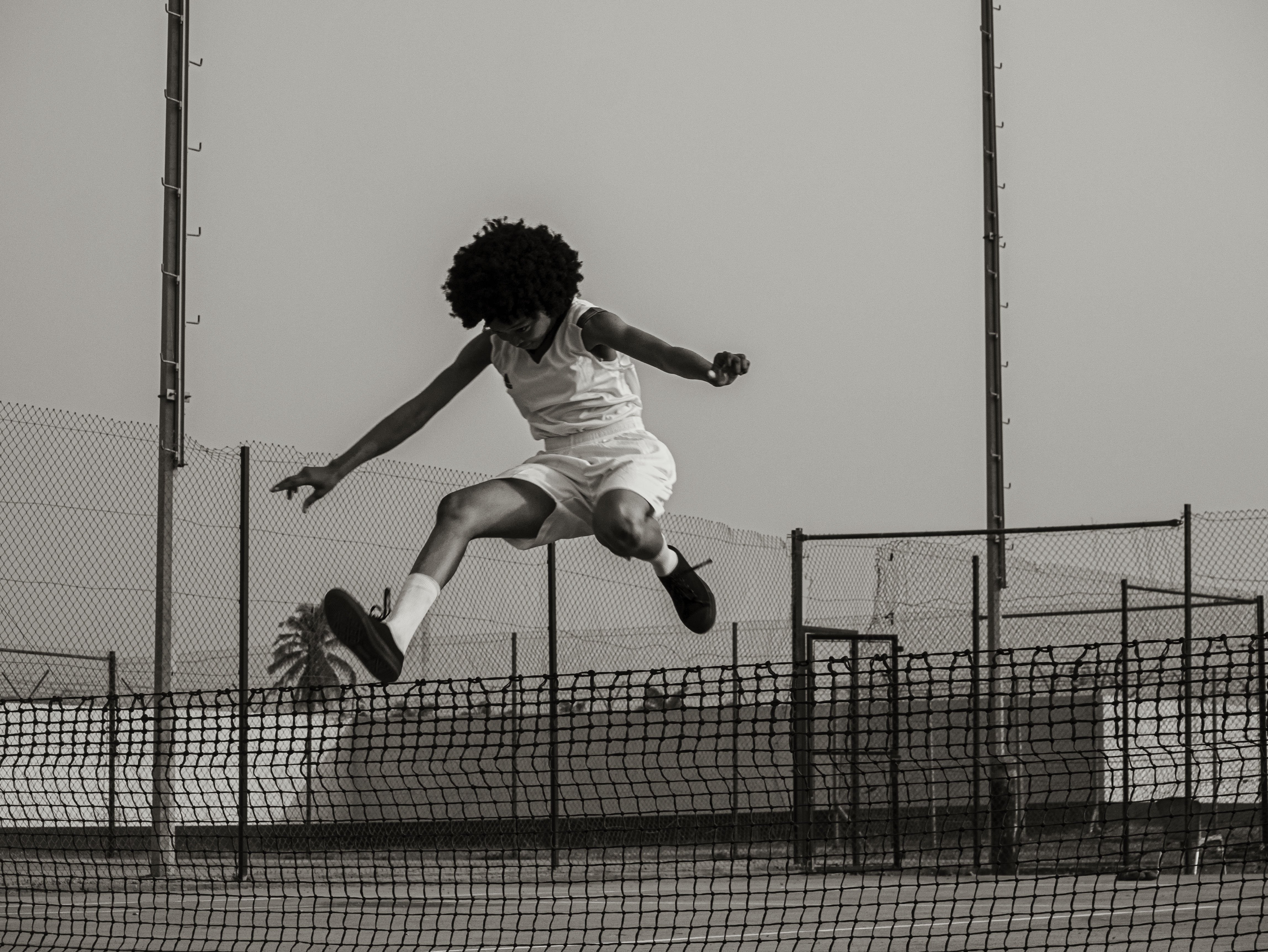 A Dreamcatchers Academy student in a recreation of a portrait of Alice Coachman, American athlete and the first Black woman to win an Olympic gold medal. Photo: DocumentWomen/Dreamcatchers Academy.