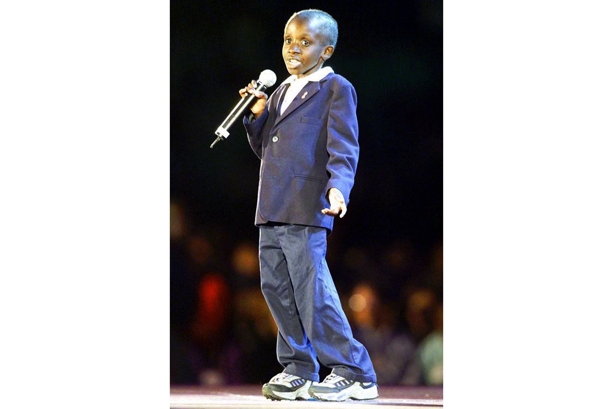 Activist Nkosi Johnson addresses the opening of the 13th International Aids Conference in Durban, South Africa in this file photo from July 9, 2000.