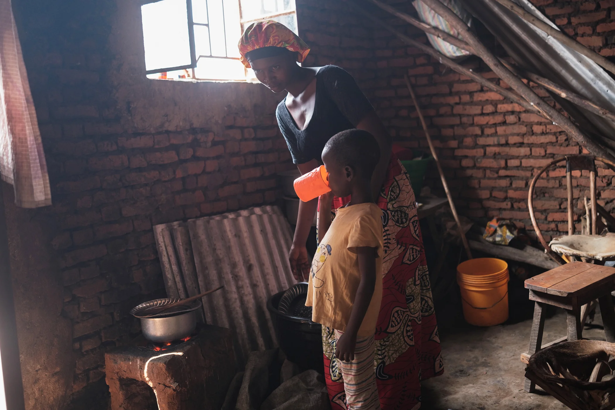 Kaneza Ndayisaba and her mother, Belyse, in their home in Gaharawe village, near Burundi’s western border in July 2025. Kaneza experienced partial paralysis in her legs and one arm after contracting poliovirus due to missing routine immunizations. Kaneza Ndayisaba and her mother, Belyse, in their home in Gaharawe village, near Burundi’s western border in July 2025. Kaneza experienced partial paralysis in her legs and one arm after contracting poliovirus due to missing routine immunizations.