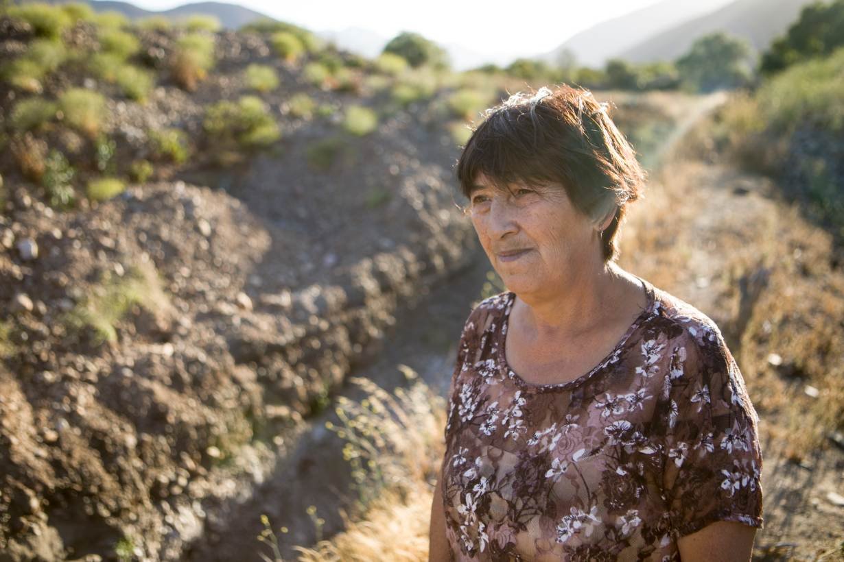 Gimena Gonzalez, a resident of Petorca, Chile, pictured by the well on her farmland that is suffering from a lack of water, December 10, 2018.
