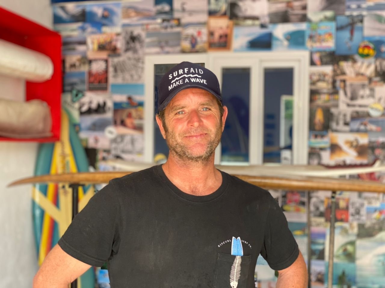 Brett Davies, Founder of Mr. Bright's Surf School in a surf factory