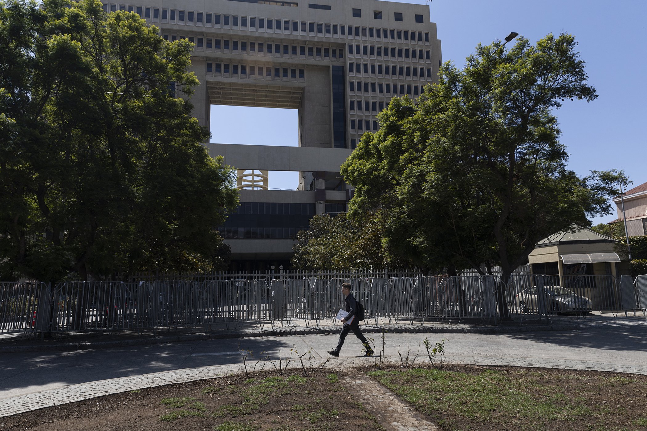 Sebastián Benfeld walks in front of the Congress headquarters in Valparaíso, in Chile on Feb. 20, 2023.